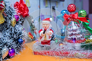 New Year's toys. Merry christmas puppet . Little Santa Claus plush toy isolated