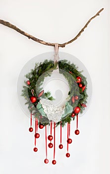 New Year`s wreath of fir branches, baby cradle for a newborn