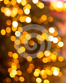 New Year`s yellow gold sparkle party lights background