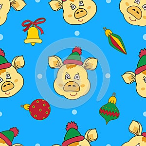 New year seamless pattern with yellow pigs fase and Christmas toy,bell on a blue