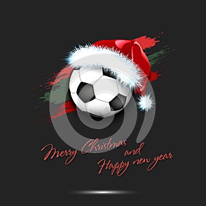 New year and soccer ball in santa hat