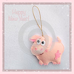 New year. Soft toy made of felt. The cute pig. Christmas tree decoration. Symbol of year. 2019.