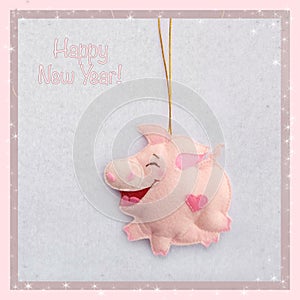 New year. Soft toy made of felt. The cute pig. Christmas tree decoration. Symbol of year. 2019.