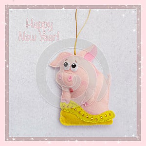 New year. Soft toy made of felt. The cute pig. Piggy gets out of the bag. Christmas tree decoration. Symbol of year. 2019.