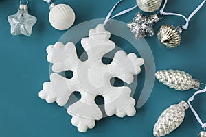 New year toys, christmas tree toys, white and gray toys on the blue background