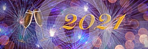 New Year 2021! Two glasses of champagne on blurred background of colorful fireworks. Bokeh. Celebration. Festive. Event. Header.