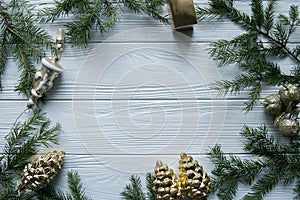 New Year and winter set on white wooden background with fir tree, striped golden and white 2018
