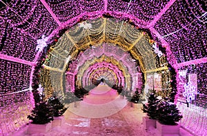 New year and Xmas street decoration in night illuminated Moscow, LED light tunnel