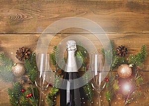 New Years Christmas Celebration Background with Pair of Wineglasses and Bottle of Champagne Christmas New Year Card Fir Decoration