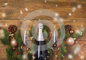 New Years Christmas Celebration Background with Pair of Wineglasses and Bottle of Champagne Christmas New Year Card Fir Decoration