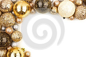 New Years Eve corner border of gold, black and white ornaments over white photo