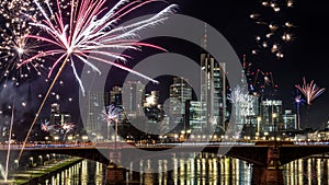 New years eve with fireworks above the skyline of Frankfurt.