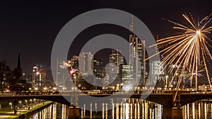 New years eve with fireworks above the skyline of Frankfurt.