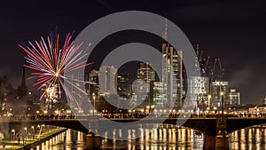 New years eve with fireworks above the skyline of Frankfurt.