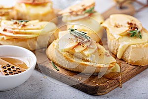 New Years Eve party appetizer, pear and brie crostini