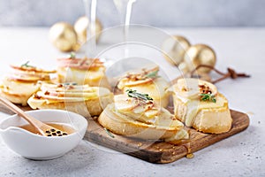 New Years Eve party appetizer, pear and brie crostini