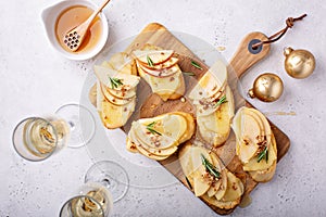 New Years Eve party appetizer, pear and brie crostini