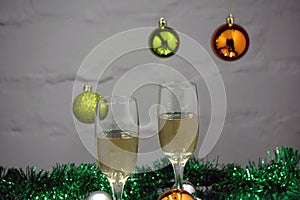New years eve party table with champagne flute ribbon and golden glitter