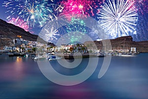 New years fireworks display over the Puerto de Mogan town, Gran Canaria. Spain