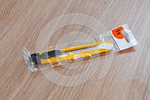 New yellow cutter knife with push button blade lock