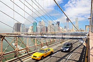 New York, Brooklyn Bridge and taxi cab