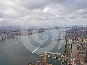 New York City. Beautiful aerial view of Manhattan. Sun over buildings.