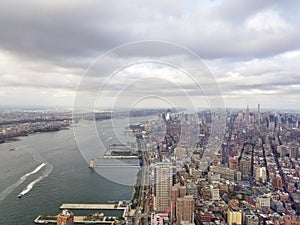 New York City. Beautiful aerial view of Manhattan. Sun over buildings.