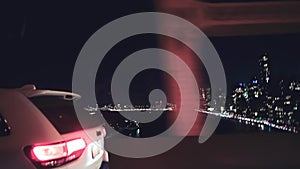 New York City Bridge from a moving car at night
