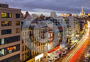 New York City busy overhead street view of Bowery with car lights streaking down the road from long exposure