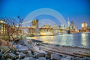 NEW YORK CITY - DECEMBER 6TH, 2018: Night view of Brooklyn Bridge and Lower Manhattan from Brooklyn district, New York City