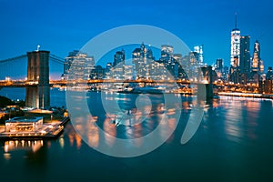 New York City at dusk with Brooklyn Bridge