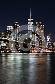 New York City empty streets. NYC skyline with Brooklyn bridge at night