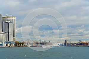 New York City financial district and Brooklin Bridge, view from the Hudson River.