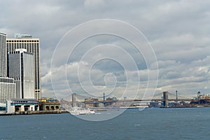 New York City financial district and Brooklin Bridge, view from the Hudson River.