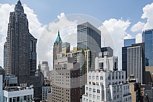 New York City lower Manhattan skyline view with skyscrapers and blue sky in the day.