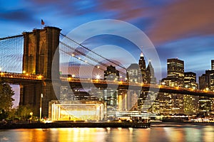 New York City Manhattan Downtown with Brooklyn Bridge at Dusk