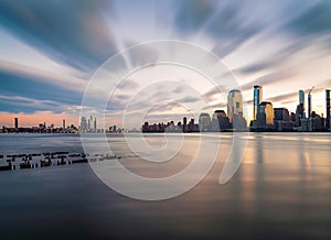 New York City. Manhattan downtown skyline skyscrapers at sunset.