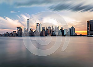 New York City. Manhattan downtown skyline skyscrapers at sunset.