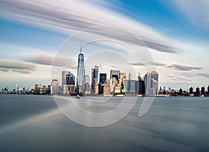 New York City. Manhattan downtown skyline skyscrapers at sunset.