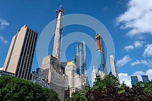 New York City Manhattan skyline panorama viewed from Central Park with cloud and blue sky