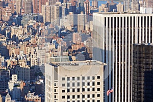 New York City Manhattan skyscrapers aerial view and USA flag