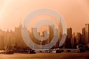 New York City midtown Manhattan skyline panorama view from Boulevard East Old Glory Park over Hudson River.