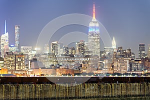 New York City by night. Aerial view of Manhattan lights, USA