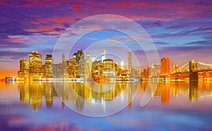 New York City night panorama with Brooklyn Bridge