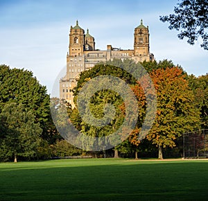 Quiet autumn view of the Beresford building across Central Park Great Lawn in Upper West Side, Manhattan, New York City