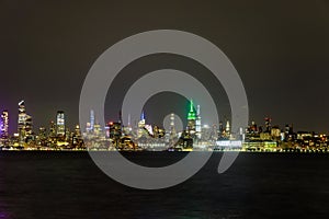 New York City panorama skyline at Manhattan office buildings by night