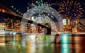 New York City's Brooklyn Bridge and Manhattan skyline illuminated amazing fireworks in Independence day