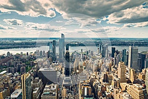 New York City Skyline Aerial View with Dramatic Cloudy Sky in Background