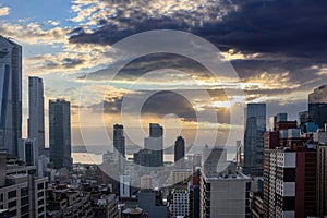 New York city skyline. Aerial view of NY Manhattan skyscrapers, cloudy sky at sunset