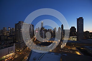 New York City skyline at dusk looking south down Broadway from Lincoln Center, New York City, New York, USA